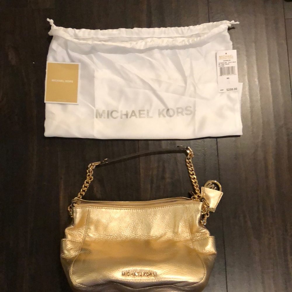 Brand new never worn gold Michael Kors bag